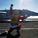 Santa launches planes aboard USS Dwight. D. Eisenhower.